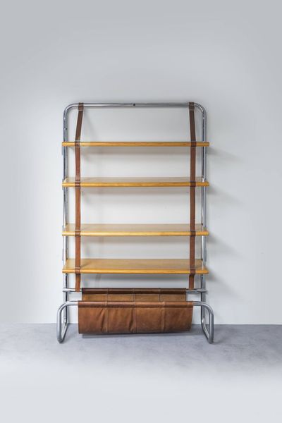 LUIGI MASSONI : Libreria Jumbo line con struttura in acciaio cromato  pelle  legno naturale.  Prod. Frau 1971 cm 190x120x40 Bibl.: Domus 500 (luglio 1971)  pag. 34; Domus 507 (febbraio 1972) pag. d/535;  Abitare 108 supplemento 1971/72 (settembre 1972) pag. 266; Casa Amica 17 aprile 1973 pag 69  - Asta Design - Associazione Nazionale - Case d'Asta italiane