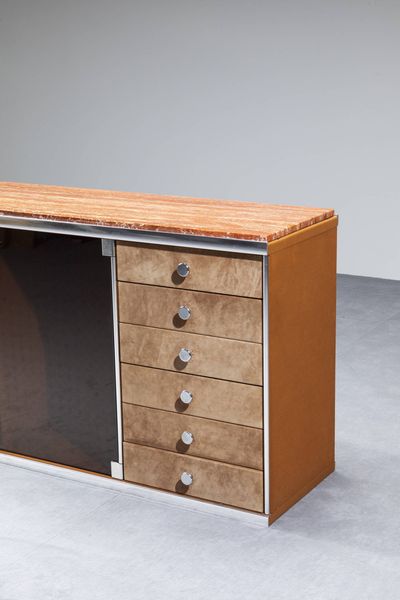 GUIDO FALESCHINI : Credenza da due elementi con struttura rivestita velluto profili in acciaio satinato e piano in marmo.  Prod. I Mariani anni '70 cm 85x250x46  - Asta Design - Associazione Nazionale - Case d'Asta italiane