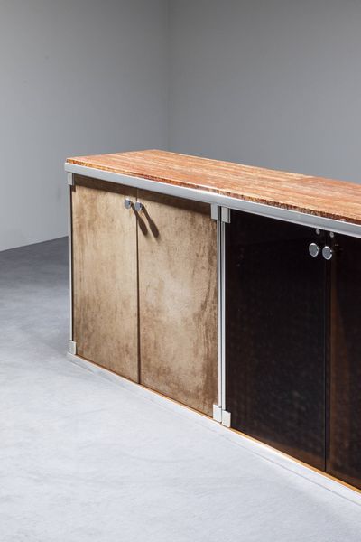 GUIDO FALESCHINI : Credenza da due elementi con struttura rivestita velluto profili in acciaio satinato e piano in marmo.  Prod. I Mariani anni '70 cm 85x250x46  - Asta Design - Associazione Nazionale - Case d'Asta italiane