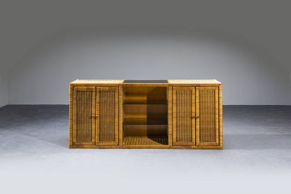 VIVAI DEL SUD : Mobile contenitore in bamboo con piani in vetro. Prod. Vivai del Sud anni '70 cm 84 5x197x41  - Asta Design - Associazione Nazionale - Case d'Asta italiane