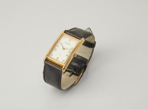 BUCHERER : Orologio rettangolare in metallo dorato con indici arabi e cinturino in pelle nera.  - Asta Asta 402 | GIOIELLI - OROLOGI Online - Associazione Nazionale - Case d'Asta italiane