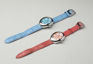 LOCMAN : Due orologi in acciaio con cassa ovale con cinturino rosso e azzurro.  - Asta Asta 402 | GIOIELLI - OROLOGI Online - Associazione Nazionale - Case d'Asta italiane