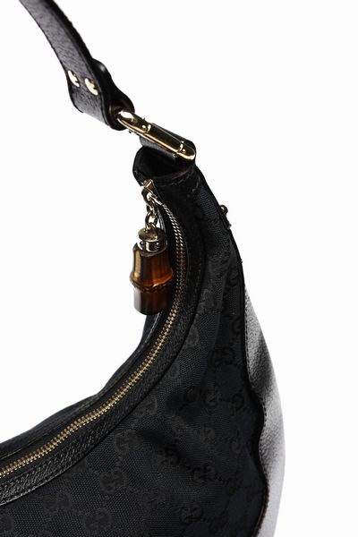 GUCCI : Borsa Gucci logo nera e dettagli bamb.  - Asta 04/05/2023 | FASHION LUXURY - ALTA MODA, BORSE E ACCESSORI DI LUSSO Online - Associazione Nazionale - Case d'Asta italiane