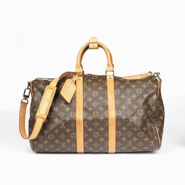 Louis Vuitton : LOUIS VUITTON BORSA VIAGGIO KEEPALL BANDOULIERE 45  - Asta VINTAGE: BORSE E ACCESSORI DI HERMES, LOUIS VUITTON E ALTRE GRANDI MAISON - Associazione Nazionale - Case d'Asta italiane