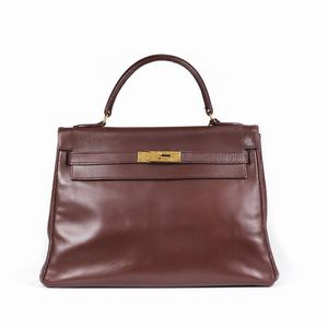 HERMES : HERMES VINTAGE KELLY RETOURNE 32  - Asta VINTAGE: BORSE E ACCESSORI DI HERMES, LOUIS VUITTON E ALTRE GRANDI MAISON - Associazione Nazionale - Case d'Asta italiane