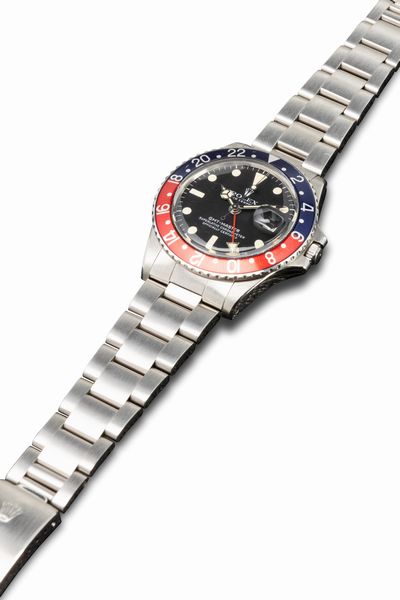 ROLEX : Iconico e sportivo GMT Master Pepsi ref 1675 in acciaio inossidabile quadrante nero opaco con pallettoni al trizio ghiera bicolore con doppio fuso orario Storia colori Pepsi  - Asta Orologi da Polso e da Tasca - Associazione Nazionale - Case d'Asta italiane