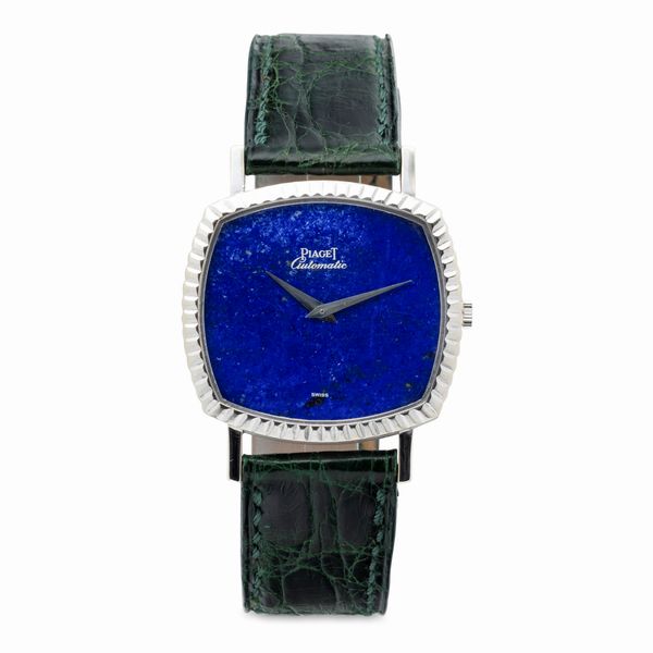 Piaget : Fine ed elegante orologio di forma a cuscino automatico con quadrante in pietra Lapis Lazuli, ghiera e carrure zigrinata  - Asta Orologi da Polso e da Tasca - Associazione Nazionale - Case d'Asta italiane