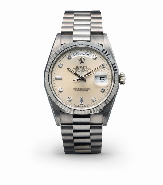 ROLEX : Fine ed elegante Day-Date ref 18239, in oro bianco 18, quadrante Argent con indici delle ore in diamanti, bracciale President con chiusura a scomparsa, accompagnato da garanzia originale  - Asta Orologi da Polso e da Tasca - Associazione Nazionale - Case d'Asta italiane