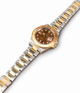 ROLEX : Intrigante GMT Master II ref 16713 Occhio di Tigre in acciaio e oro con ghiera girevole bicolore, doppio fuso orario, quadrante Brown e bracciale Oyster  - Asta Orologi da Polso e da Tasca - Associazione Nazionale - Case d'Asta italiane