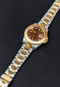 ROLEX : Intrigante GMT Master II ref 16713 Occhio di Tigre in acciaio e oro con ghiera girevole bicolore, doppio fuso orario, quadrante Brown e bracciale Oyster  - Asta Orologi da Polso e da Tasca - Associazione Nazionale - Case d'Asta italiane