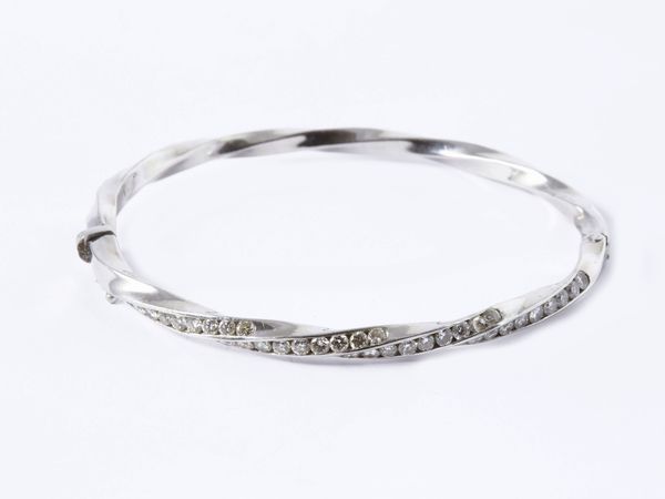 Bracciale rigido in oro bianco con diamanti  - Asta Gioielli e Orologi - Associazione Nazionale - Case d'Asta italiane