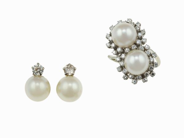Lotto costituito da un anello contrari e un paio di orecchini con perle e diamanti  - Asta Gioielli - Associazione Nazionale - Case d'Asta italiane