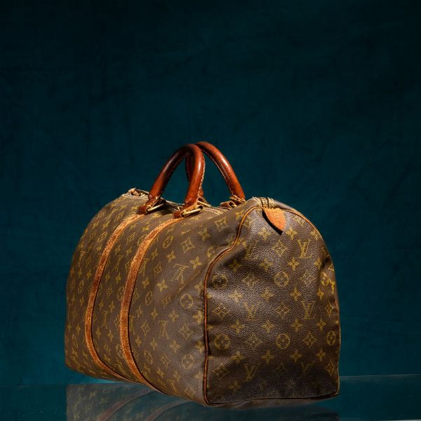Louis Vuitton Keepal  - Asta Luxury Vintage e Penne da Collezione - Associazione Nazionale - Case d'Asta italiane