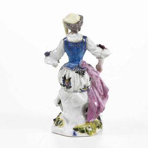 Figurina<BR>Meissen, 1750 circa (porcellana).<BR>Decorazione probabilmente XIX secolo.<BR><BR>  - Asta Ceramiche - Associazione Nazionale - Case d'Asta italiane