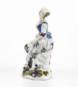 Figurina<BR>Meissen, 1750 circa (porcellana).<BR>Decorazione probabilmente XIX secolo.<BR><BR>  - Asta Ceramiche - Associazione Nazionale - Case d'Asta italiane