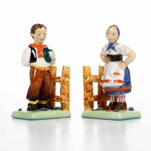 Una coppia di figurine e una coppia di reggilibri <BR>Italia, prima met de XX secolo  - Asta Ceramiche - Associazione Nazionale - Case d'Asta italiane