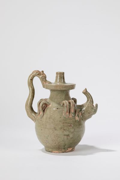 Antico versatoio cinese in ceramica a invetriatura celadon  - Asta Incanti d'Asia - Associazione Nazionale - Case d'Asta italiane