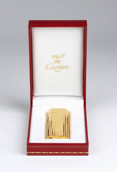 Le Must de CARTIER: accendino - anni '80  - Asta Gioielli, orologi, argenti e penne - Associazione Nazionale - Case d'Asta italiane