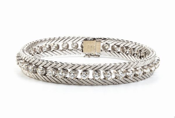 Bracciale in oro bianco e diamanti  - Asta Gioielli, orologi, argenti e penne - Associazione Nazionale - Case d'Asta italiane