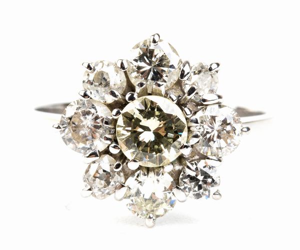 Anello a fiore in diamanti ed oro bianco  - Asta Gioielli, orologi, argenti e penne - Associazione Nazionale - Case d'Asta italiane