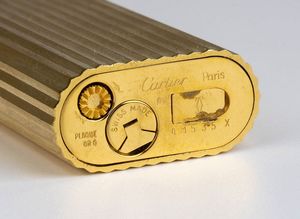 Le Must de CARTIER: accendino - anni '80  - Asta Gioielli, orologi, argenti e penne - Associazione Nazionale - Case d'Asta italiane