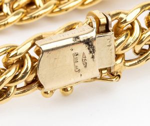 Parure composta da un girocollo, un bracciale ed un paio di orecchini in oro rubini e diamanti  - Asta Gioielli, orologi, argenti e penne - Associazione Nazionale - Case d'Asta italiane