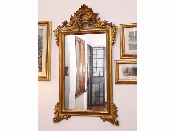 Specchiera con cornice in legno intagliato e dorato  - Asta Una villa fiorentina. Arredi e Dipinti Antichi. Arte Contemporanea - Associazione Nazionale - Case d'Asta italiane