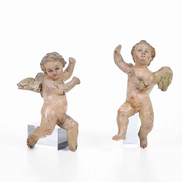 Due putti in legno policromo, XIX secolo  - Asta Scultura - Associazione Nazionale - Case d'Asta italiane