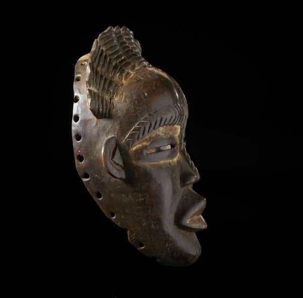 Dan - Costa d'Avorio/Liberia : Maschera antropomorfa. Legno duro a  patina scura.  - Asta Asta 422 | AFRICA, OCEANIA E AMERICHE - ARTIGIANATO AFRICANO: VARI COMMITTENTI E SELEZIONE DALLA COLLEZIONE BARTOLOMUCCI Online - Associazione Nazionale - Case d'Asta italiane