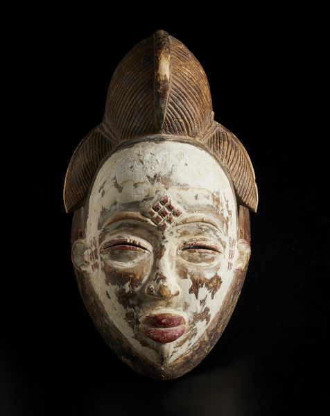 Punu - Gabon : Maschera antropomorfa femminile. Legno, caolino e pigmenti.  - Asta Asta 422 | AFRICA, OCEANIA E AMERICHE - ARTIGIANATO AFRICANO: VARI COMMITTENTI E SELEZIONE DALLA COLLEZIONE BARTOLOMUCCI Online - Associazione Nazionale - Case d'Asta italiane