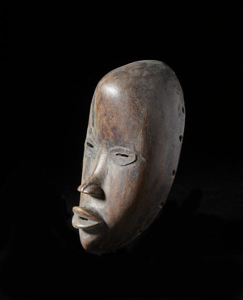 Dan - Costa d'Avorio/Liberia : Maschera antropomorfa.Legno a patina marrone e metallo.  - Asta Asta 422 | AFRICA, OCEANIA E AMERICHE - ARTIGIANATO AFRICANO: VARI COMMITTENTI E SELEZIONE DALLA COLLEZIONE BARTOLOMUCCI Online - Associazione Nazionale - Case d'Asta italiane