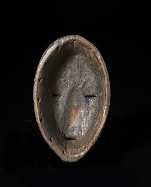 Dan - Costa d'Avorio/Liberia : Maschera antropomorfa.Legno a patina marrone e metallo.  - Asta Asta 422 | AFRICA, OCEANIA E AMERICHE - ARTIGIANATO AFRICANO: VARI COMMITTENTI E SELEZIONE DALLA COLLEZIONE BARTOLOMUCCI Online - Associazione Nazionale - Case d'Asta italiane