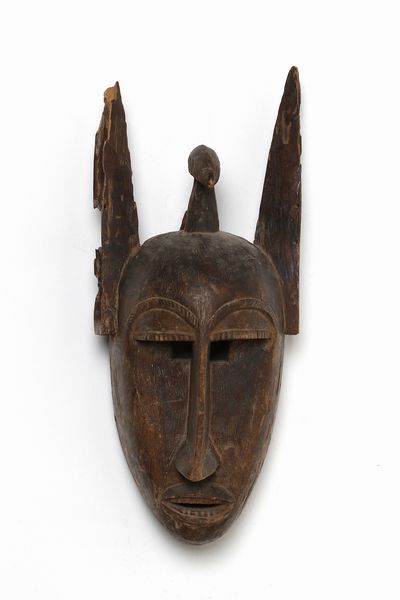 Bambara - Mali : Maschera antropozoomorfa.Legno a patina bruna.  - Asta Asta 422 | AFRICA, OCEANIA E AMERICHE - ARTIGIANATO AFRICANO: VARI COMMITTENTI E SELEZIONE DALLA COLLEZIONE BARTOLOMUCCI Online - Associazione Nazionale - Case d'Asta italiane