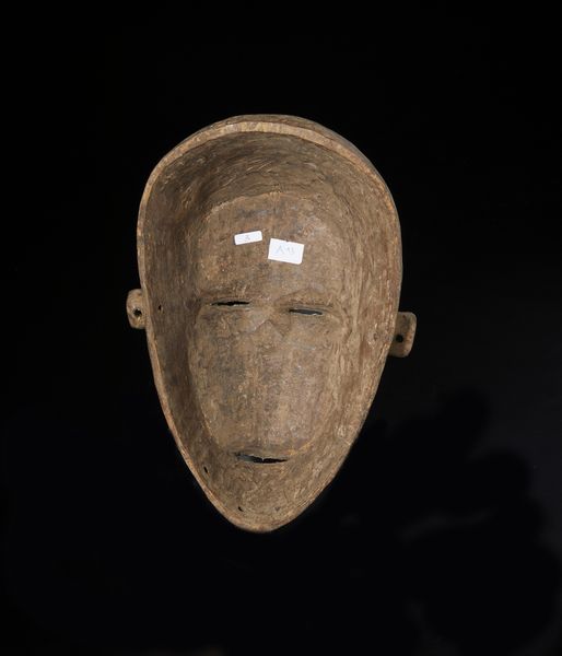 Igbo - Nigeria : Maschera antropomorfa. Legno a patina bruna, caolino e tracce di pigmenti.  - Asta Asta 422 | AFRICA, OCEANIA E AMERICHE - ARTIGIANATO AFRICANO: VARI COMMITTENTI E SELEZIONE DALLA COLLEZIONE BARTOLOMUCCI Online - Associazione Nazionale - Case d'Asta italiane