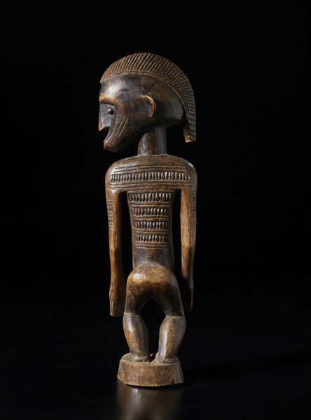 Bambara - Mali : Scultura antropomorfa con testa di profilo.Legno duro a patina bruna e scura.  - Asta Asta 422 | AFRICA, OCEANIA E AMERICHE - ARTIGIANATO AFRICANO: VARI COMMITTENTI E SELEZIONE DALLA COLLEZIONE BARTOLOMUCCI Online - Associazione Nazionale - Case d'Asta italiane