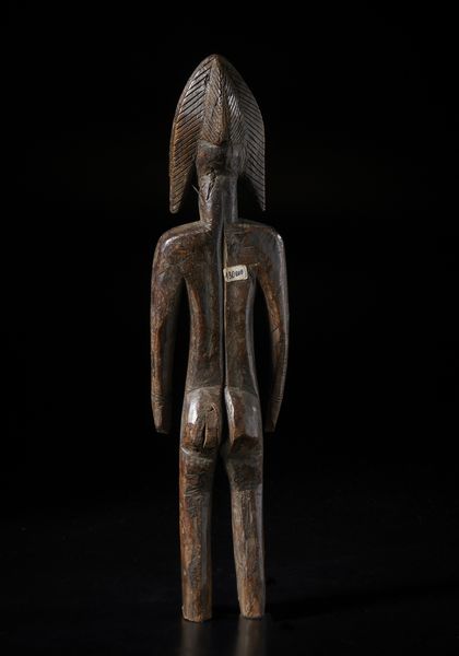 Bambara - Mali : Scultura antropomorfa.Legno duro a patina scura.  - Asta Asta 422 | AFRICA, OCEANIA E AMERICHE - ARTIGIANATO AFRICANO: VARI COMMITTENTI E SELEZIONE DALLA COLLEZIONE BARTOLOMUCCI Online - Associazione Nazionale - Case d'Asta italiane