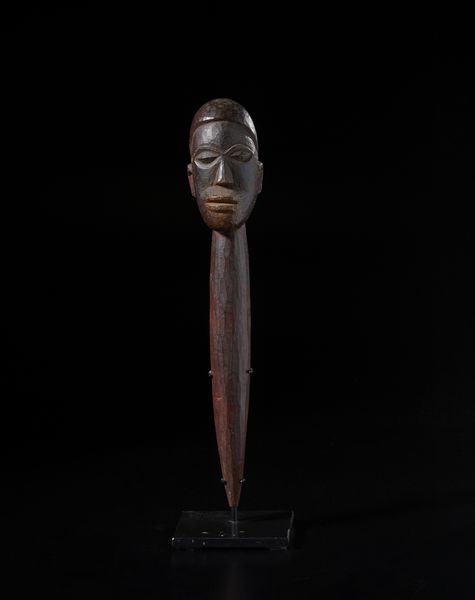 Lobi - Burkina Faso/Costa d'Avorio : Scultura in forma di  testa antropomorfa con collo allungato. Legno duro a patina scura.  - Asta Asta 422 | AFRICA, OCEANIA E AMERICHE - ARTIGIANATO AFRICANO: VARI COMMITTENTI E SELEZIONE DALLA COLLEZIONE BARTOLOMUCCI Online - Associazione Nazionale - Case d'Asta italiane