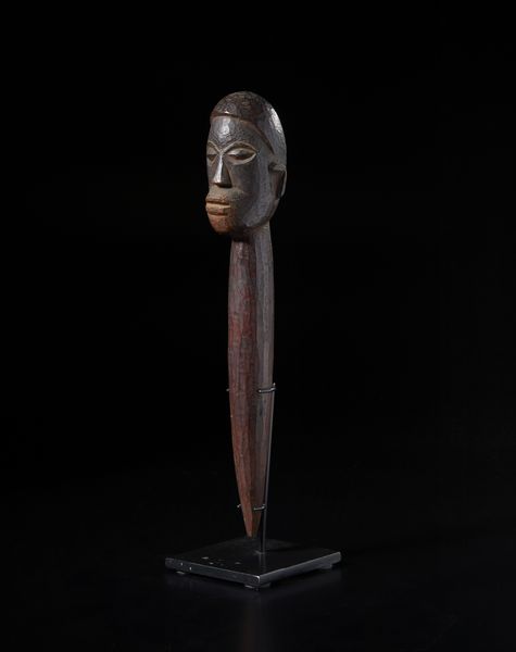 Lobi - Burkina Faso/Costa d'Avorio : Scultura in forma di  testa antropomorfa con collo allungato. Legno duro a patina scura.  - Asta Asta 422 | AFRICA, OCEANIA E AMERICHE - ARTIGIANATO AFRICANO: VARI COMMITTENTI E SELEZIONE DALLA COLLEZIONE BARTOLOMUCCI Online - Associazione Nazionale - Case d'Asta italiane