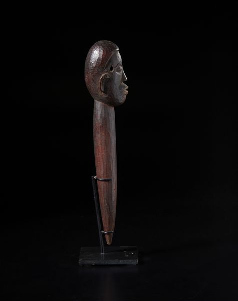 Lobi - Burkina Faso/Costa d'Avorio : Scultura in forma di  testa antropomorfa con collo allungato. Legno duro a patina scura.  - Asta Asta 422 | AFRICA, OCEANIA E AMERICHE - ARTIGIANATO AFRICANO: VARI COMMITTENTI E SELEZIONE DALLA COLLEZIONE BARTOLOMUCCI Online - Associazione Nazionale - Case d'Asta italiane