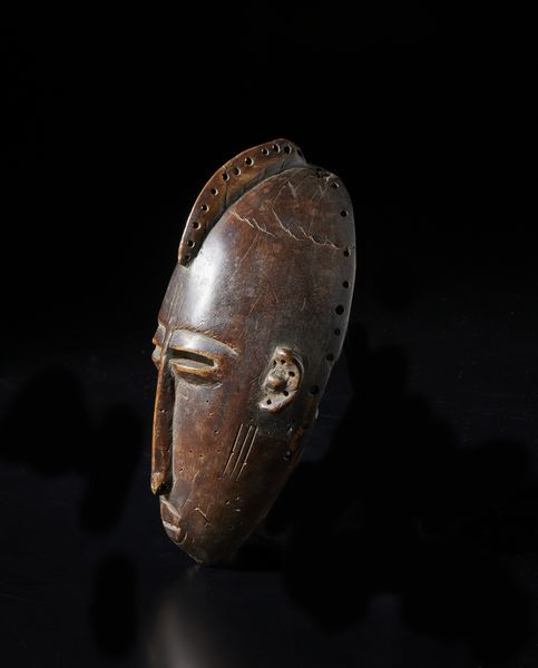 Mossi - Burkina Faso : Maschera antropomorfa. Legno con patina marrone.  - Asta Asta 422 | AFRICA, OCEANIA E AMERICHE - ARTIGIANATO AFRICANO: VARI COMMITTENTI E SELEZIONE DALLA COLLEZIONE BARTOLOMUCCI Online - Associazione Nazionale - Case d'Asta italiane