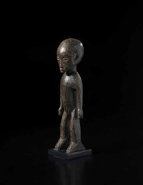 Lobi - Burkina Faso/Costa d'Avorio : Scultura antropomorfa Bateba. Legno duro con patina scura.  - Asta Asta 422 | AFRICA, OCEANIA E AMERICHE - ARTIGIANATO AFRICANO: VARI COMMITTENTI E SELEZIONE DALLA COLLEZIONE BARTOLOMUCCI Online - Associazione Nazionale - Case d'Asta italiane