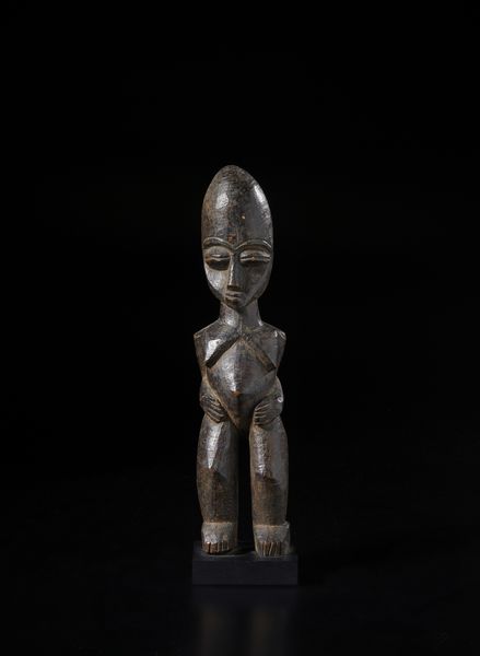 Lobi - Burkina Faso/Costa d'Avorio : Scultura antropomorfa Bateba.Legno duro a patina scura.  - Asta Asta 422 | AFRICA, OCEANIA E AMERICHE - ARTIGIANATO AFRICANO: VARI COMMITTENTI E SELEZIONE DALLA COLLEZIONE BARTOLOMUCCI Online - Associazione Nazionale - Case d'Asta italiane