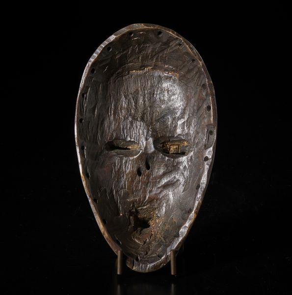 Dan - Costa d'Avorio/Liberia : Maschera. Legno duro a patina marrone.  - Asta Asta 422 | AFRICA, OCEANIA E AMERICHE - ARTIGIANATO AFRICANO: VARI COMMITTENTI E SELEZIONE DALLA COLLEZIONE BARTOLOMUCCI Online - Associazione Nazionale - Case d'Asta italiane