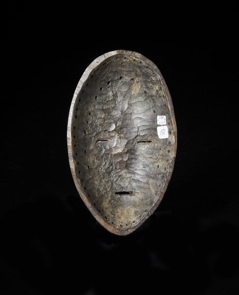 Dan - Costa d'Avorio/Liberia : Maschera antropomorfa con occhi a fessura. Legno duro a patina scura.  - Asta Asta 422 | AFRICA, OCEANIA E AMERICHE - ARTIGIANATO AFRICANO: VARI COMMITTENTI E SELEZIONE DALLA COLLEZIONE BARTOLOMUCCI Online - Associazione Nazionale - Case d'Asta italiane