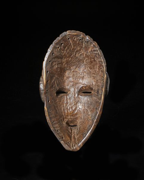 Dan - Costa d'Avorio/Liberia : Maschera antropomorfa.  Legno duro a patina marrone.  - Asta Asta 422 | AFRICA, OCEANIA E AMERICHE - ARTIGIANATO AFRICANO: VARI COMMITTENTI E SELEZIONE DALLA COLLEZIONE BARTOLOMUCCI Online - Associazione Nazionale - Case d'Asta italiane