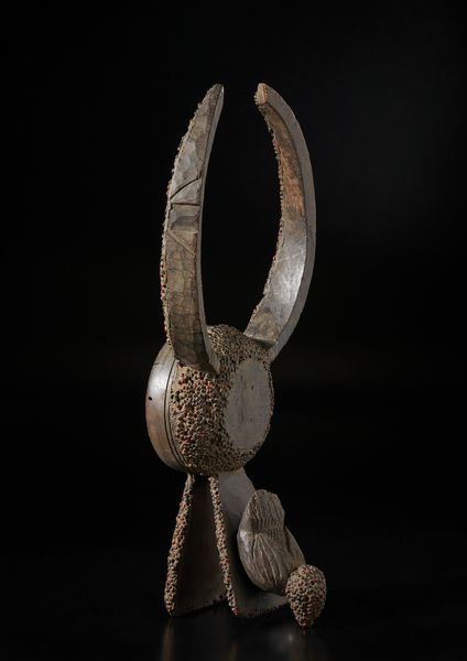 Kantana/Mama, Nigeria : Maschera zoomorfa in forma di bovide e uccello. Legno duro a patina scura, resina e semi.  - Asta Asta 422 | AFRICA, OCEANIA E AMERICHE - ARTIGIANATO AFRICANO: VARI COMMITTENTI E SELEZIONE DALLA COLLEZIONE BARTOLOMUCCI Online - Associazione Nazionale - Case d'Asta italiane