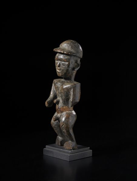 N'Buako - Repubblica Democratica del Congo : Scultura antropomorfa. Legno duro a patina scura.  - Asta Asta 422 | AFRICA, OCEANIA E AMERICHE - ARTIGIANATO AFRICANO: VARI COMMITTENTI E SELEZIONE DALLA COLLEZIONE BARTOLOMUCCI Online - Associazione Nazionale - Case d'Asta italiane