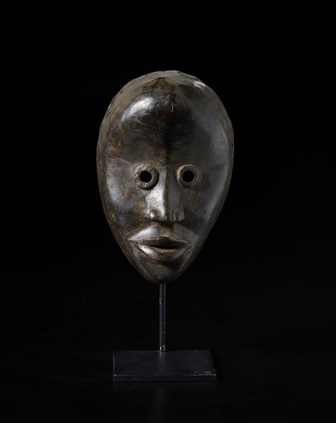 Dan - Costa d'Avorio/Liberia : Maschera con occhi tubolari. Legno duro a patina scura.  - Asta Asta 422 | AFRICA, OCEANIA E AMERICHE - ARTIGIANATO AFRICANO: VARI COMMITTENTI E SELEZIONE DALLA COLLEZIONE BARTOLOMUCCI Online - Associazione Nazionale - Case d'Asta italiane