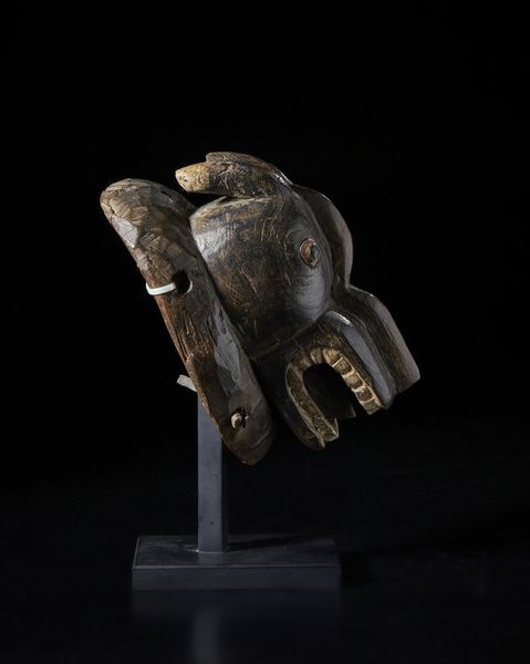 Guro - Costa d'Avorio : Maschera zoomorfa. Legno duro a patina scura e pigmenti.  - Asta Asta 422 | AFRICA, OCEANIA E AMERICHE - ARTIGIANATO AFRICANO: VARI COMMITTENTI E SELEZIONE DALLA COLLEZIONE BARTOLOMUCCI Online - Associazione Nazionale - Case d'Asta italiane