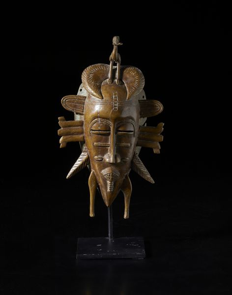 Senufo - Costa d'Avorio/Mali : Maschera Kpeli. Bronzo.  - Asta Asta 422 | AFRICA, OCEANIA E AMERICHE - ARTIGIANATO AFRICANO: VARI COMMITTENTI E SELEZIONE DALLA COLLEZIONE BARTOLOMUCCI Online - Associazione Nazionale - Case d'Asta italiane